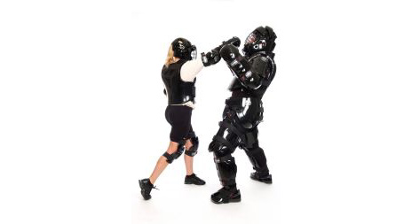 a woman employing self defense / boxing