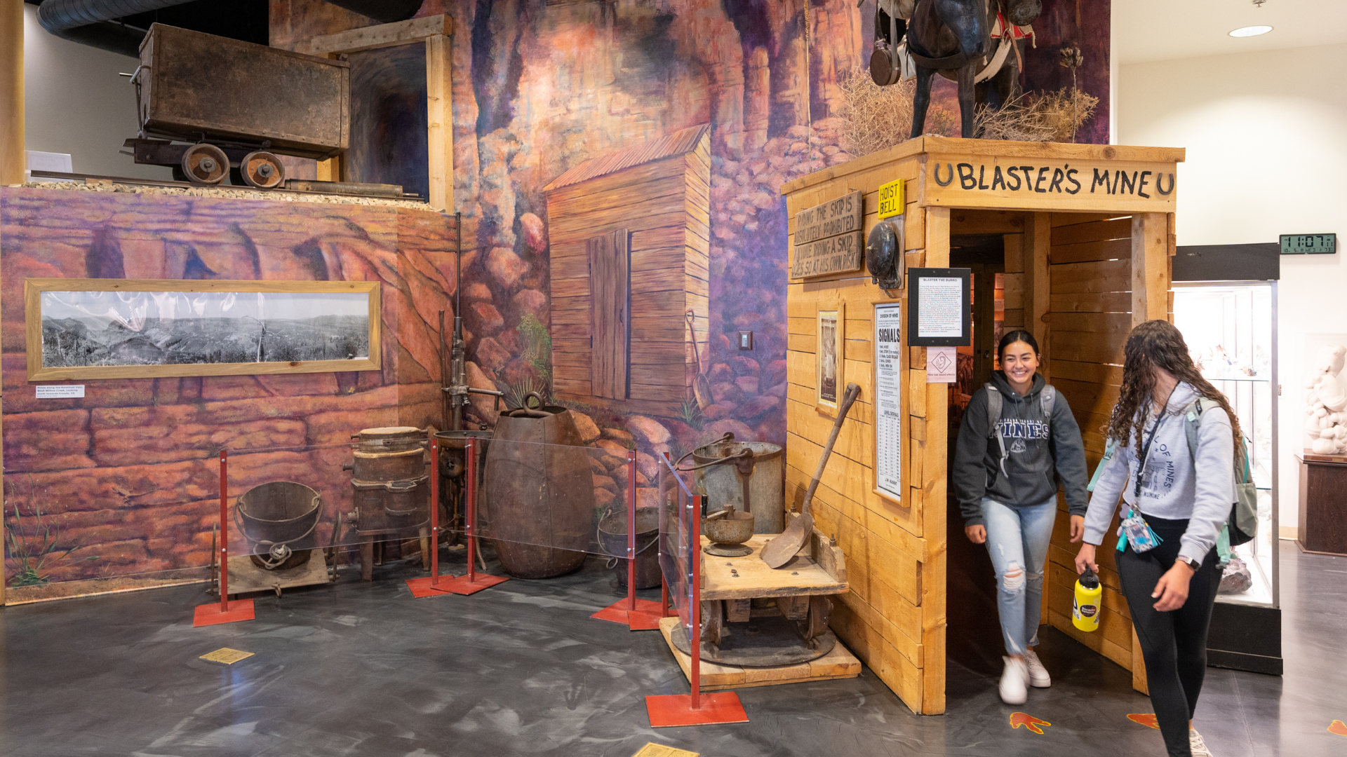 Students go through an interactive mine exhibit in the Mines museum