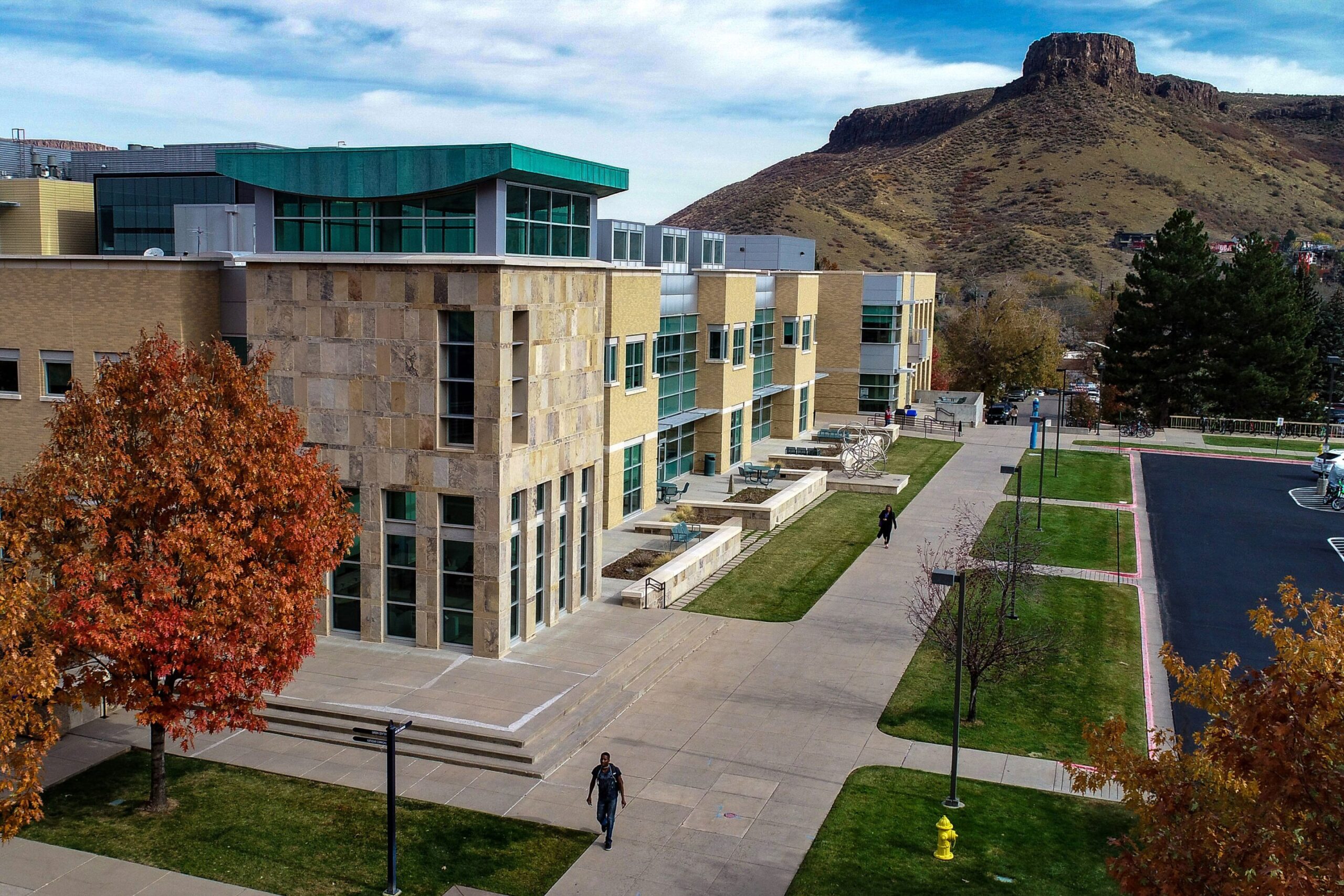 campus building with fall trees